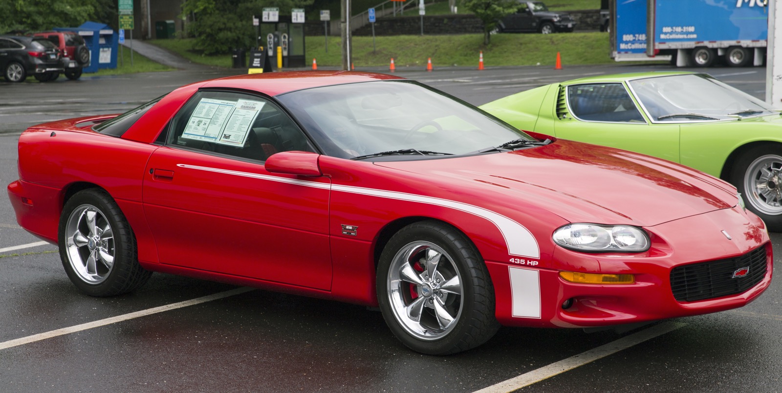 Red 2002 Camaro SS with a "435 HP" GMMG Berger Hot Rod Edition rocker stripe